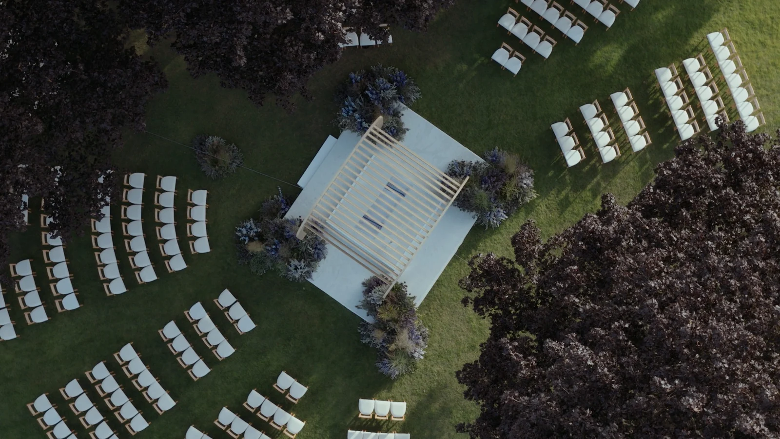 Aerial view of the chuppah and outdoor seating at Maddie and Cole’s Michigan wedding